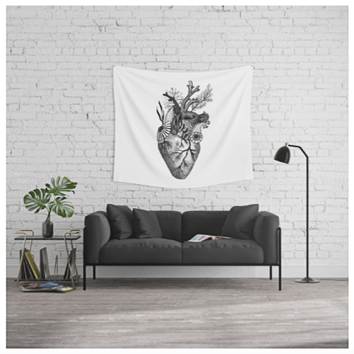 Artsy living room with Ocean Heart wall tapestry illustration by Denise Tolentino